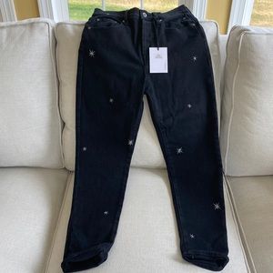 Women’s high rise button fly jeans with embroidered stats